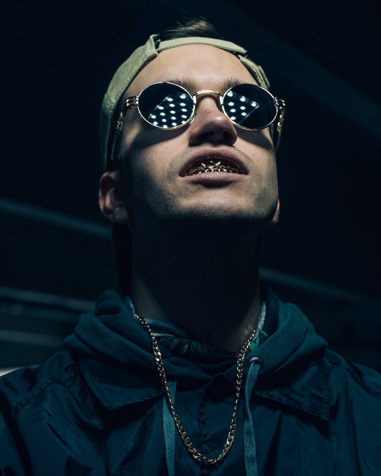 Why Rappers Wear Grillz: Understanding the Bling - BTM